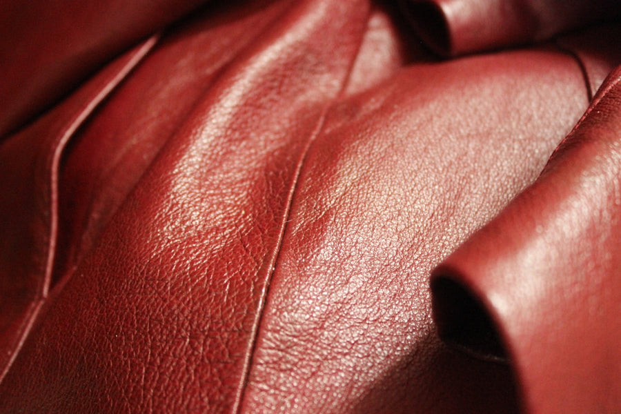 a close up of a red leather material